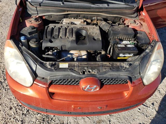 KMHCM36C09U111928 - 2009 HYUNDAI ACCENT ORANGE photo 11