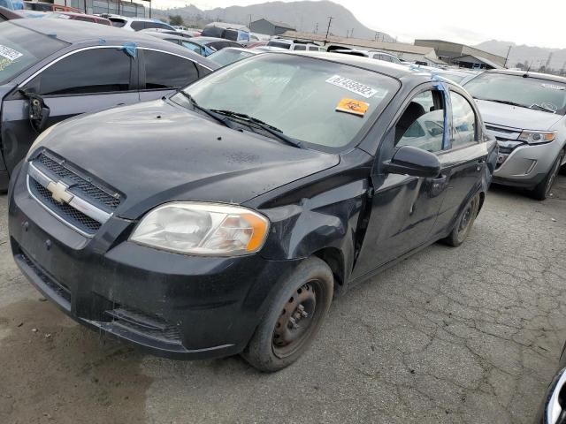 KL1TD5DEXBB257248 - 2011 CHEVROLET AVEO LS BLACK photo 1