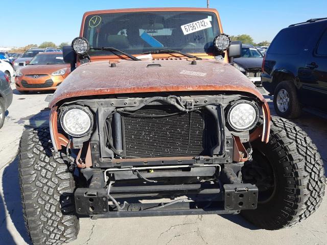 1J4AA2D13BL521757 - 2011 JEEP WRANGLER S ORANGE photo 5