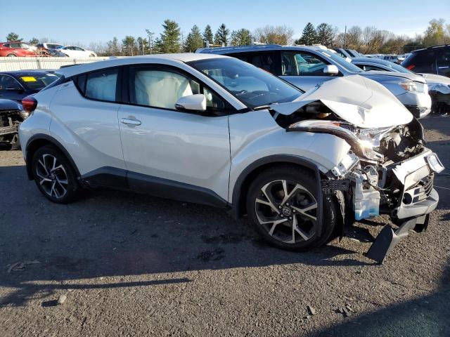 NMTKHMBX7JR021931 - 2018 TOYOTA C-HR XLE WHITE photo 4