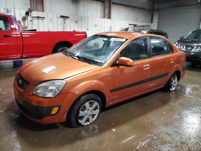 KNADE223496514608 - 2009 KIA RIO BASE ORANGE photo 1