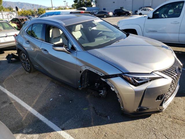 JTHU9JBH2K2005545 - 2019 LEXUS UX 250H SILVER photo 4