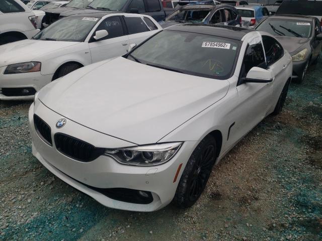 WBA4A9C54GG505855 - 2016 BMW 428 I GRAN WHITE photo 1