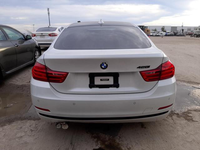 WBA4A9C54GG505855 - 2016 BMW 428 I GRAN WHITE photo 6