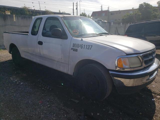 1FTDX1722VND32865 - 1997 FORD F150 WHITE photo 4