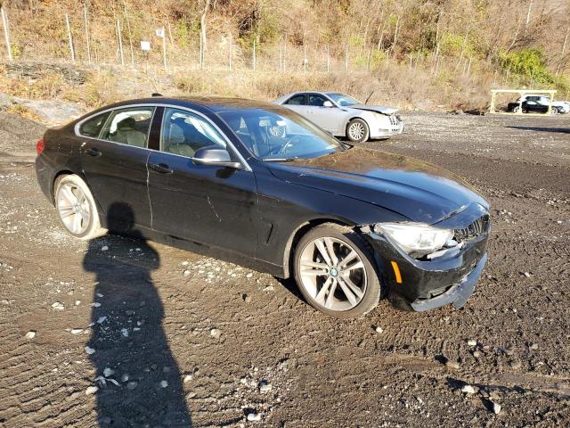 WBA4C9C51GG137497 - 2016 BMW 428 XI GRA BLACK photo 4
