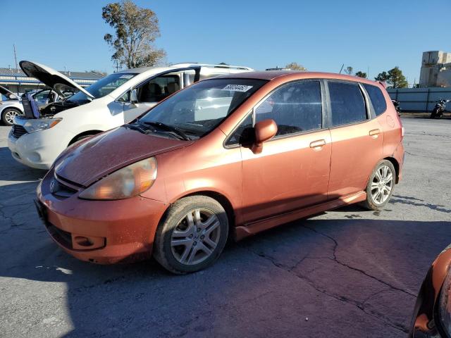 JHMGD38627S051509 - 2007 HONDA FIT S ORANGE photo 1