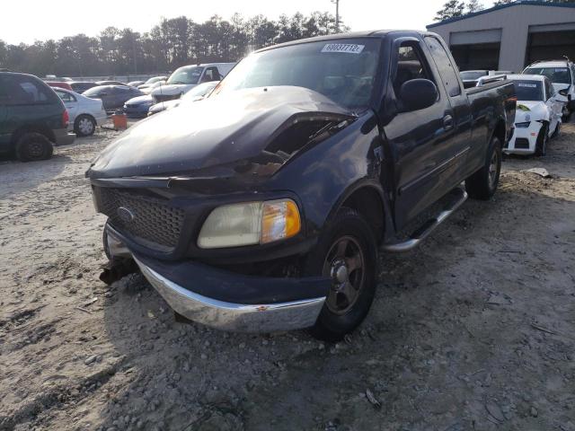 1FTRX17WX2NB48715 - 2002 FORD F-150 LARI BLACK photo 1