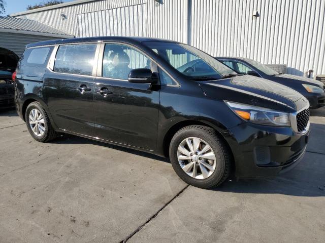 KNDMA5C18F6026142 - 2015 KIA SEDONA L BLACK photo 4