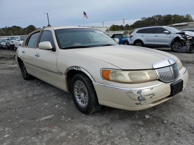 1LNHM83W7YY915264 - 2000 LINCOLN TOWNCAR BEIGE photo 4