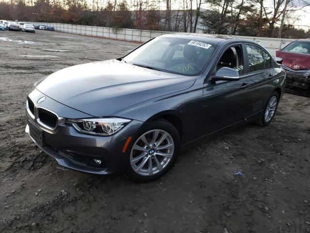 WBA8E5G56JNV01768 - 2018 BMW 320 XI GRAY photo 1