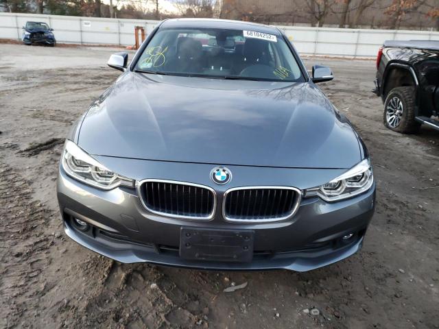 WBA8E5G56JNV01768 - 2018 BMW 320 XI GRAY photo 5