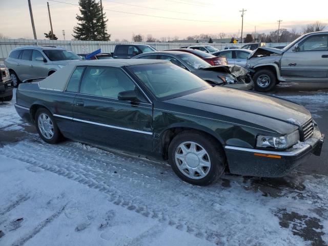 1G6ET1295VU611725 - 1997 CADILLAC ELDORADO T GREEN photo 4