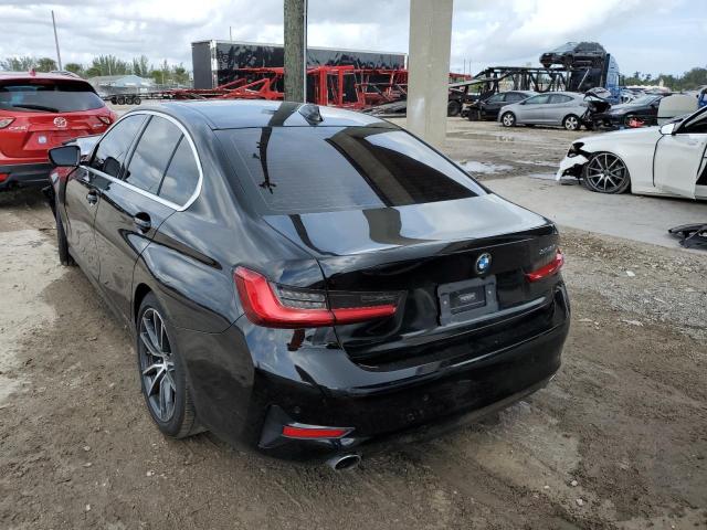 WBA5R1C53KAK11728 - 2019 BMW 330I BLACK photo 2