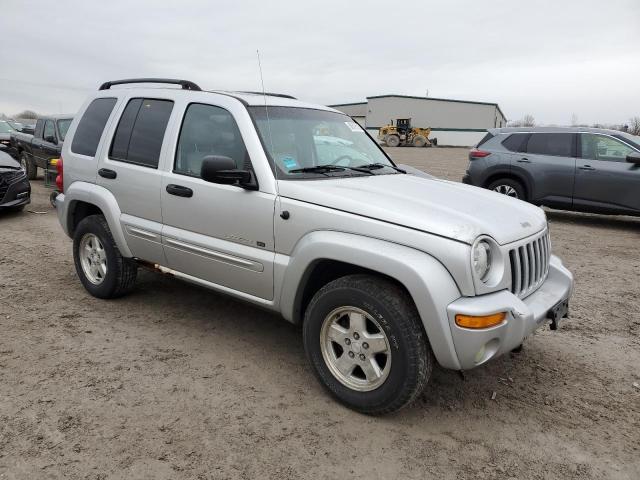 1J8GL58K22W344026 - 2002 JEEP LIBERTY SILVER photo 4