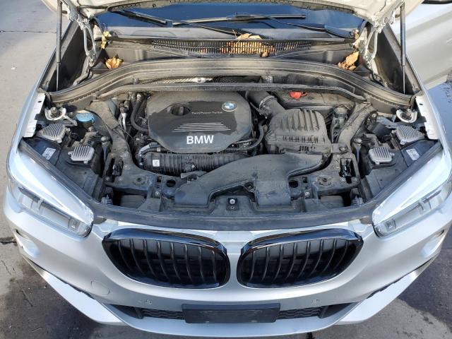 WBXHT3C34G5E56071 - 2016 BMW X1 XDRIVE2 SILVER photo 12