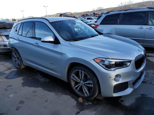 WBXHT3C34G5E56071 - 2016 BMW X1 XDRIVE2 SILVER photo 4