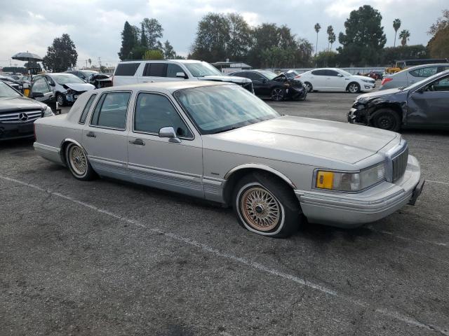 1LNLM83W4NY617602 - 1992 LINCOLN TOWN CAR C GRAY photo 4