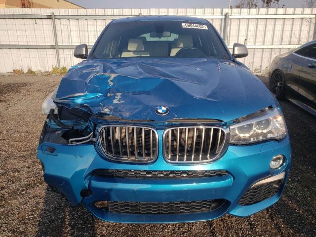 5UXXW7C56J0W64106 - 2018 BMW X4 XDRIVEM BLUE photo 5