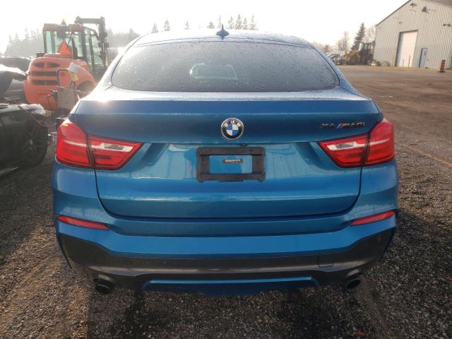 5UXXW7C56J0W64106 - 2018 BMW X4 XDRIVEM BLUE photo 6