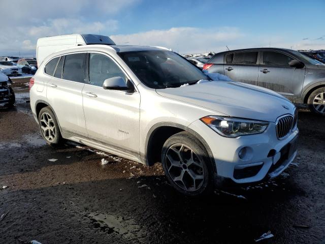 WBXHT3C32H5F70927 - 2017 BMW X1 XDRIVE2 WHITE photo 4