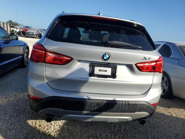 WBXHT3Z31H4A57200 - 2017 BMW X1 XDRIVE2 SILVER photo 6