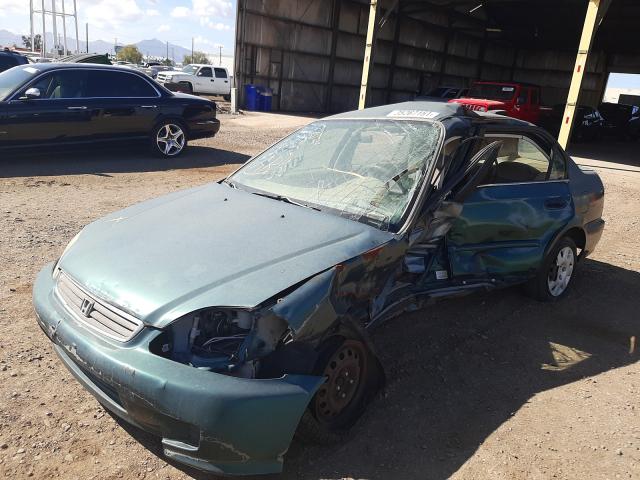 2HGEJ6610XH574577 - 1999 HONDA CIVIC BASE GREEN photo 2