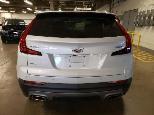 1GYFZDR46MF056308 - 2021 CADILLAC XT4 PREMIU WHITE photo 6