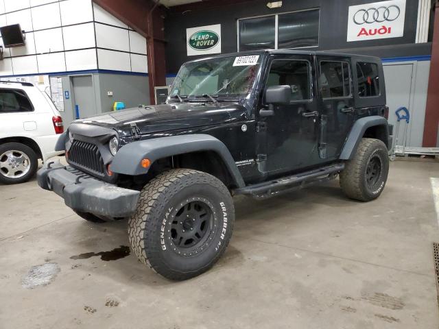 1J4GA69189L745790 - 2009 JEEP WRANGLER U BLACK photo 1