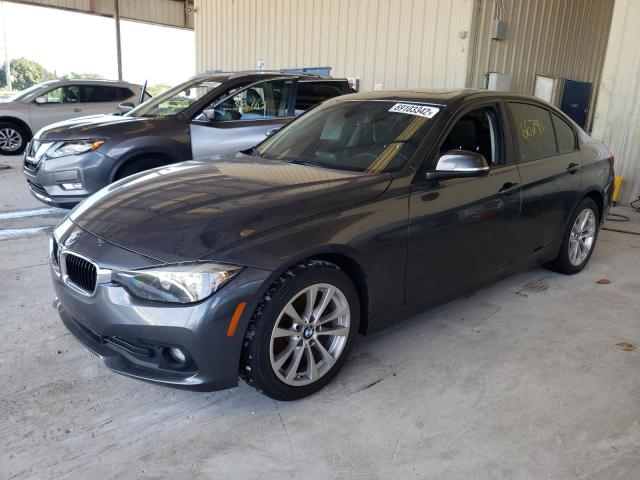 WBA8E5G33HNU42901 - 2017 BMW 320 XI GRAY photo 1