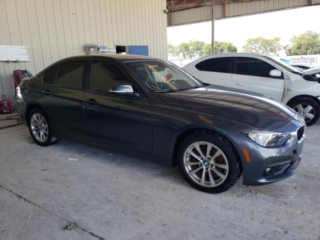 WBA8E5G33HNU42901 - 2017 BMW 320 XI GRAY photo 4