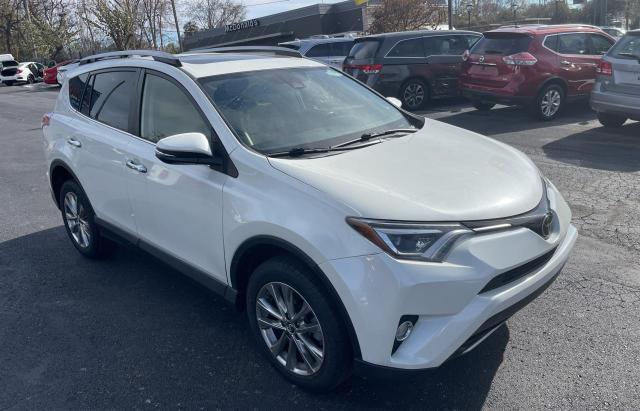 JTMYFREV5JD120655 - 2018 TOYOTA RAV4 LIMIT WHITE photo 1