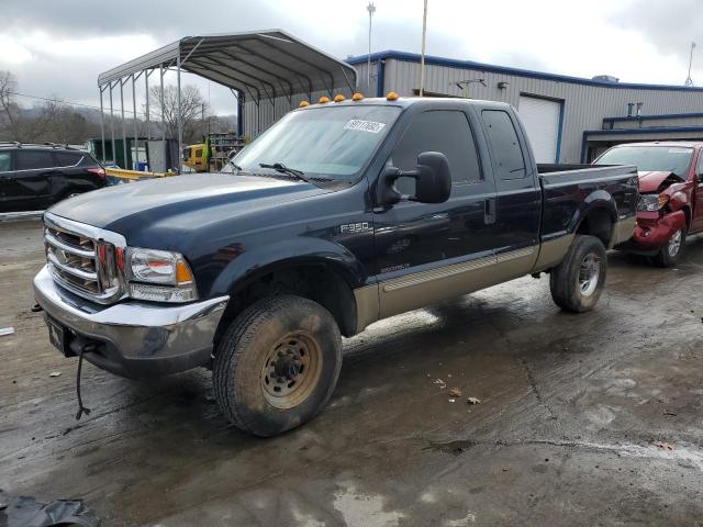 1FTSX31F3YED66302 - 2000 FORD F350 SRW S BLUE photo 1