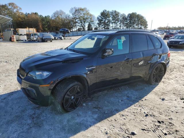 5YMGY0C54BLK26873 - 2011 BMW X5 M BLACK photo 1