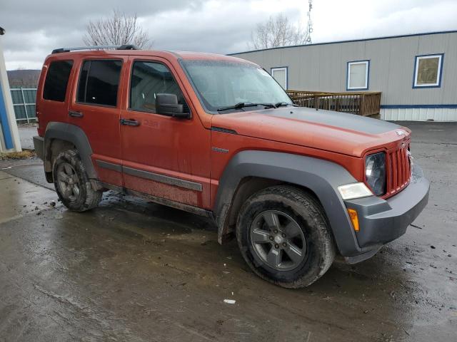 1J4PN3GK8AW146633 - 2010 JEEP LIBERTY RE ORANGE photo 4