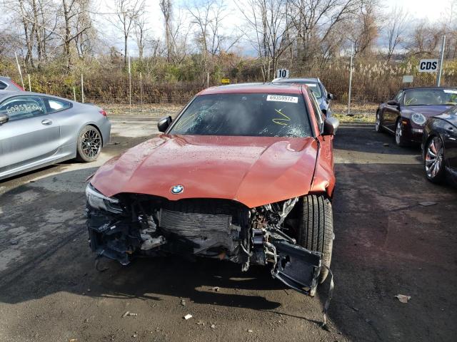 3MW5U9J00N8C24635 - 2022 BMW M340XI ORANGE photo 5