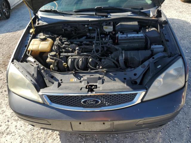 1FAFP34N17W296687 - 2007 FORD FOCUS ZX4 GRAY photo 11