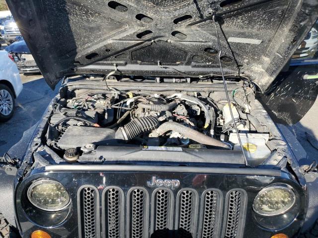 1J4AA2D15AL110567 - 2010 JEEP WRANGLER S BLACK photo 11