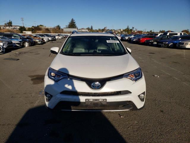 JTMDJREV4JD246678 - 2018 TOYOTA RAV4 HV LI WHITE photo 5