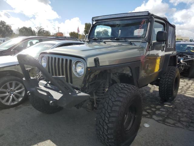 1J4FA59SX3P342909 - 2003 JEEP WRANGLER / GRAY photo 1