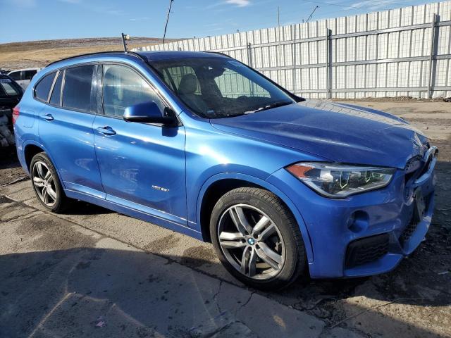 WBXHT3C33H5F70466 - 2017 BMW X1 XDRIVE2 BLUE photo 4