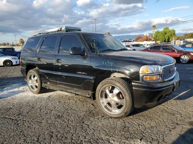 1GKEK63U52J152374 - 2002 GMC DENALI BLACK photo 4