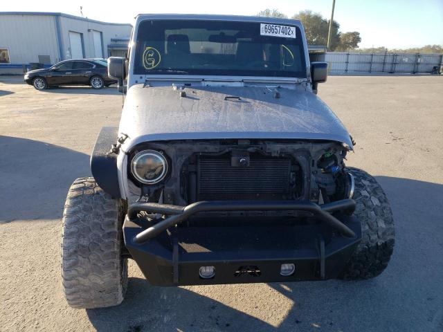 1C4AJWAG4FL608207 - 2015 JEEP WRANGLER S SILVER photo 5