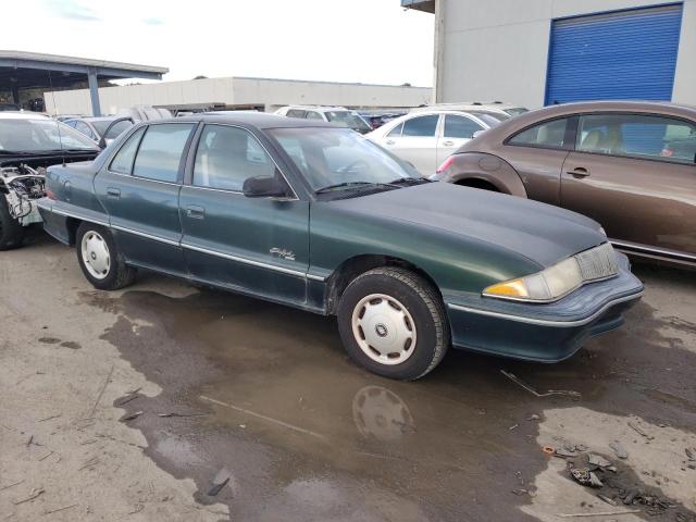 1G4NV55D5SC412170 - 1995 BUICK SKYLARK GR GREEN photo 4