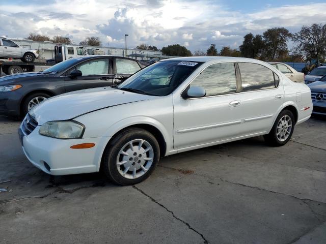 JN1CA31D91T823638 - 2001 NISSAN MAXIMA GXE WHITE photo 1