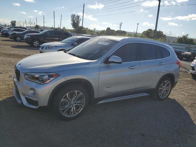 WBXHT3Z34H4A52461 - 2017 BMW X1 XDRIVE2 SILVER photo 1