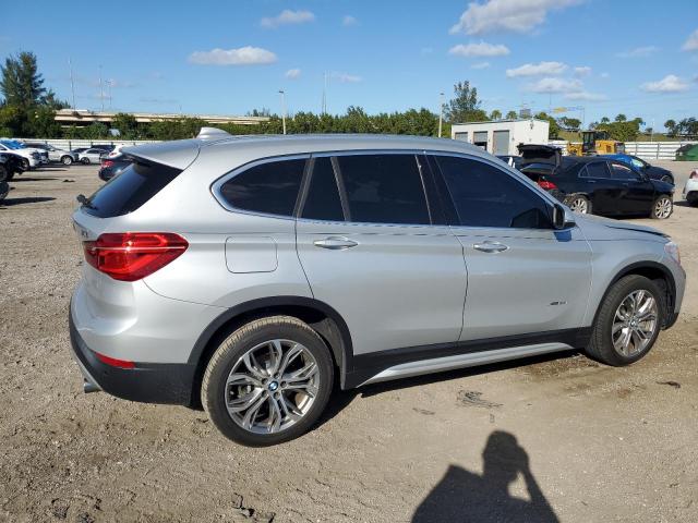 WBXHT3Z34H4A52461 - 2017 BMW X1 XDRIVE2 SILVER photo 3