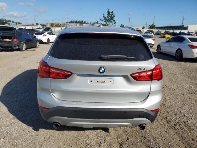 WBXHT3Z34H4A52461 - 2017 BMW X1 XDRIVE2 SILVER photo 6