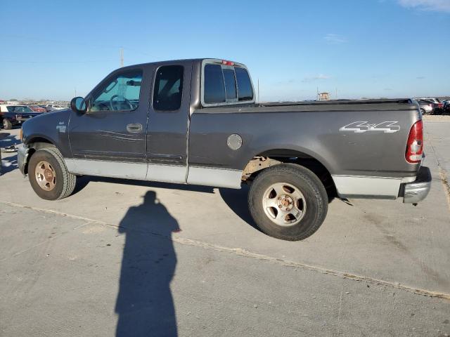 2FTRX18W04CA62837 - 2004 FORD F-150 HERI GRAY photo 2