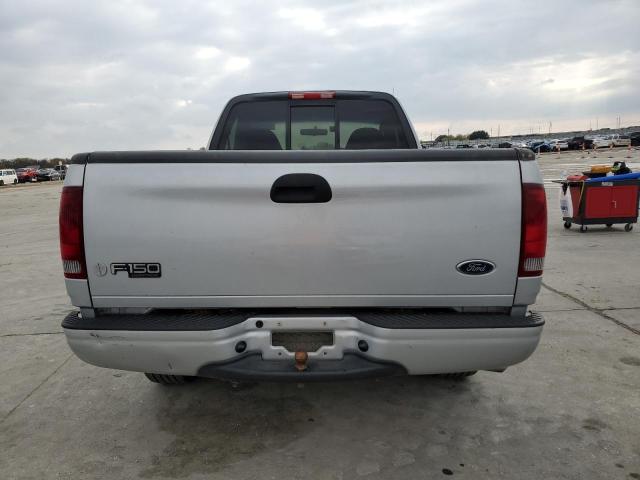 2FTRF17284CA73697 - 2004 FORD F-150 HERI SILVER photo 6